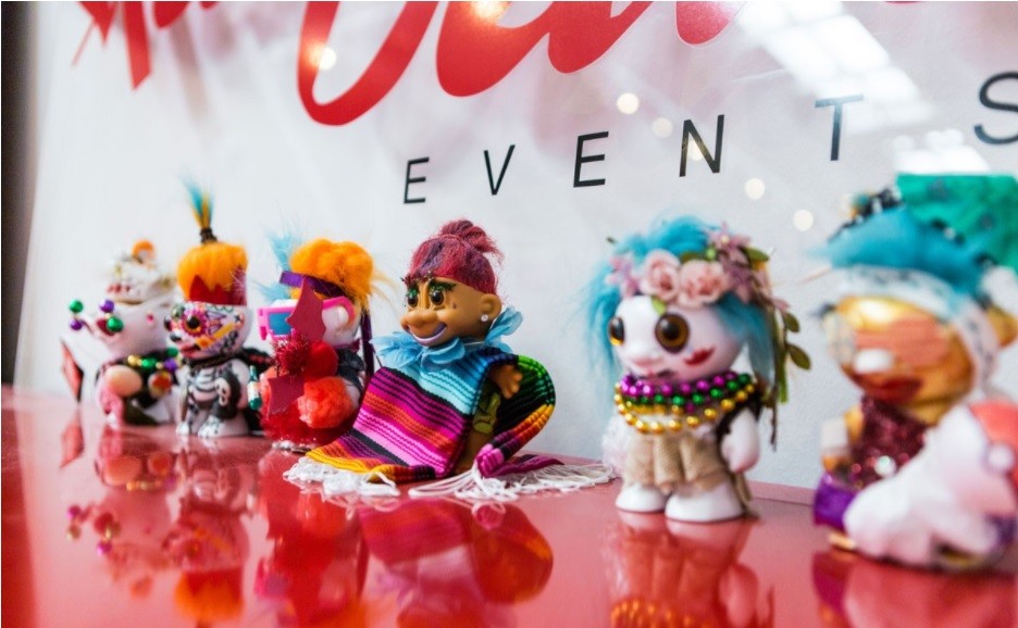 An image of the troll dolls Red Velvet Events use as trophies for employees who go above and beyond.